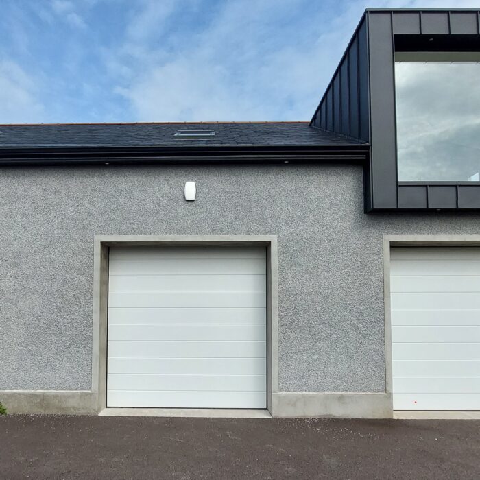 3 White Wide Ribbed Sectional Doors